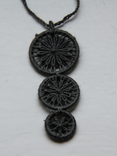 Dorset Button Neclace made with embroidery silk dyed with black hollyhock (height 5cm).